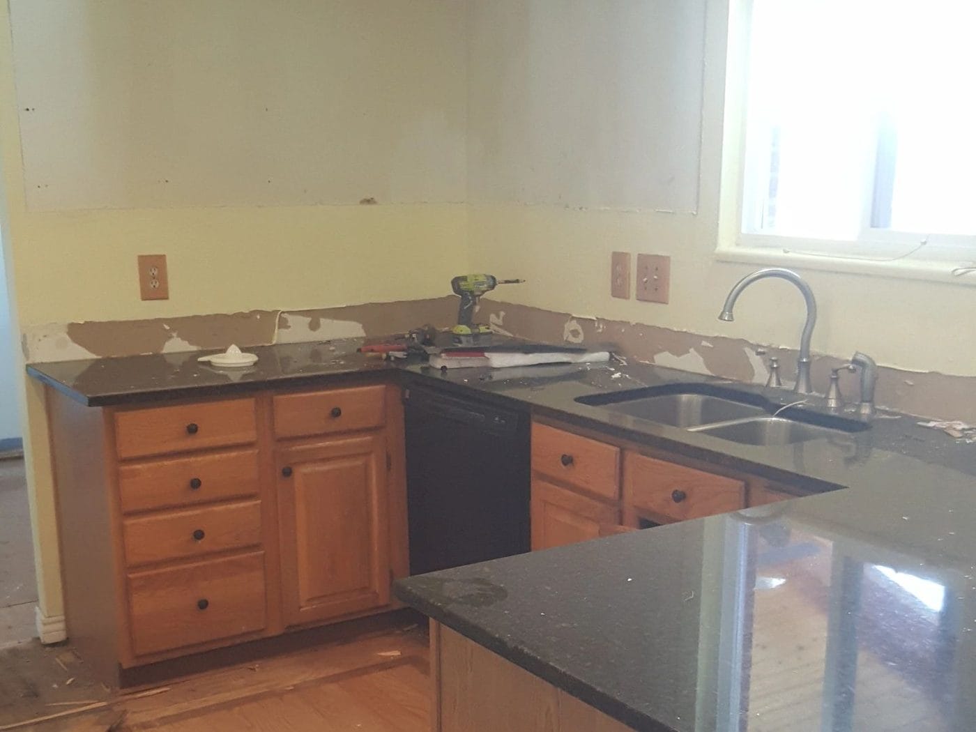 Kitchen stripped out, walls opened and services exposed