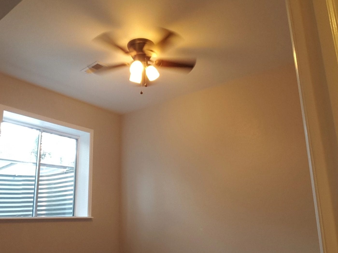 Window trimmed out and the ceiling finished and painted